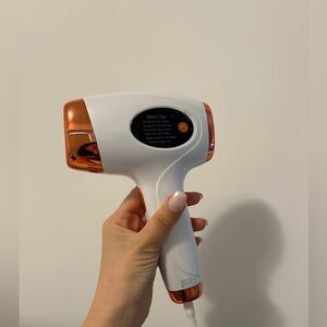 White and Copper Hair Removal Device